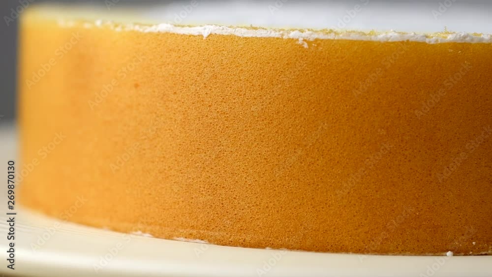 Vanilla Whipping Cream Cake Roll, Close-up Rotating in 4K Resolution Vanilla Whipping Cream Cake Roll, Close-up Rotating in 4K Resolution
