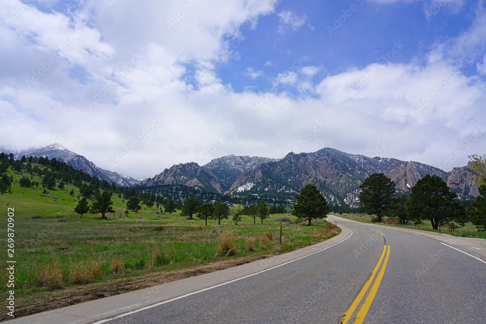 Driving on the road in the Rocky Mountains in Boulder, Colorado