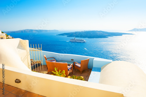 Santorini island, Greece. Beautiful terrace with sea view. Famous travel destination, luxury greek resort.