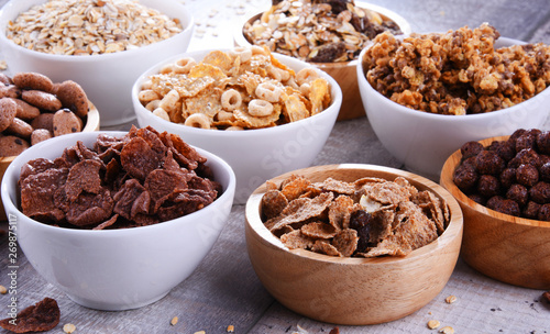 Vászonkép Bowls with different sorts of breakfast cereal products