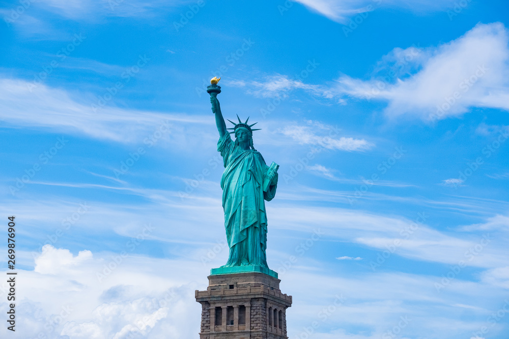 Fototapeta premium The Statue of Liberty in New York City , with cloudy background ,