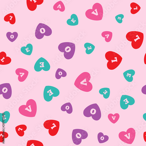 Seamless pattern with colored hearts with letters L, O, V, E. Romantic print. Vector illustration.