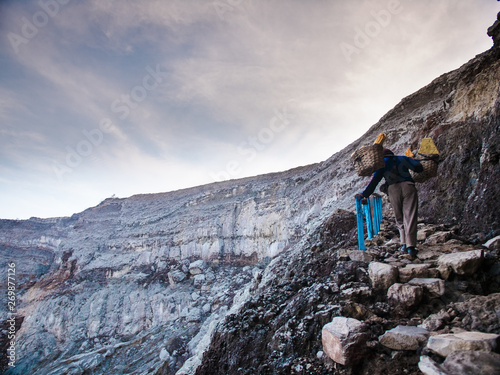 Sulfer Miners walking inside the crater