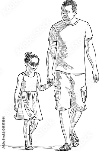 Father with his daughter strolling in a sunny summer day