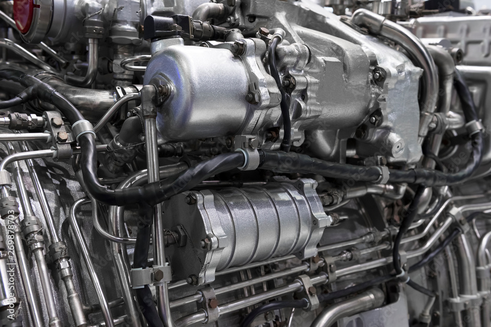 Engine of fighter jet, internal structure with hydraulic, fuel pipes and other hardware and equipment, army aviation, military aircraft and aerospace industry Engine of fighter jet, internal structure with hydraulic, fuel pipes and other hardware and equipment, army aviation, military aircraft and aerospace industry