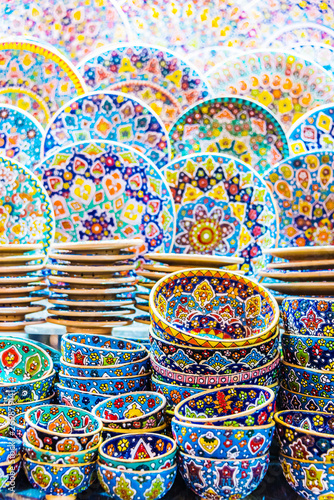 Colorful pottery dishes sold in Dubai souk  Unied Arab Emirates