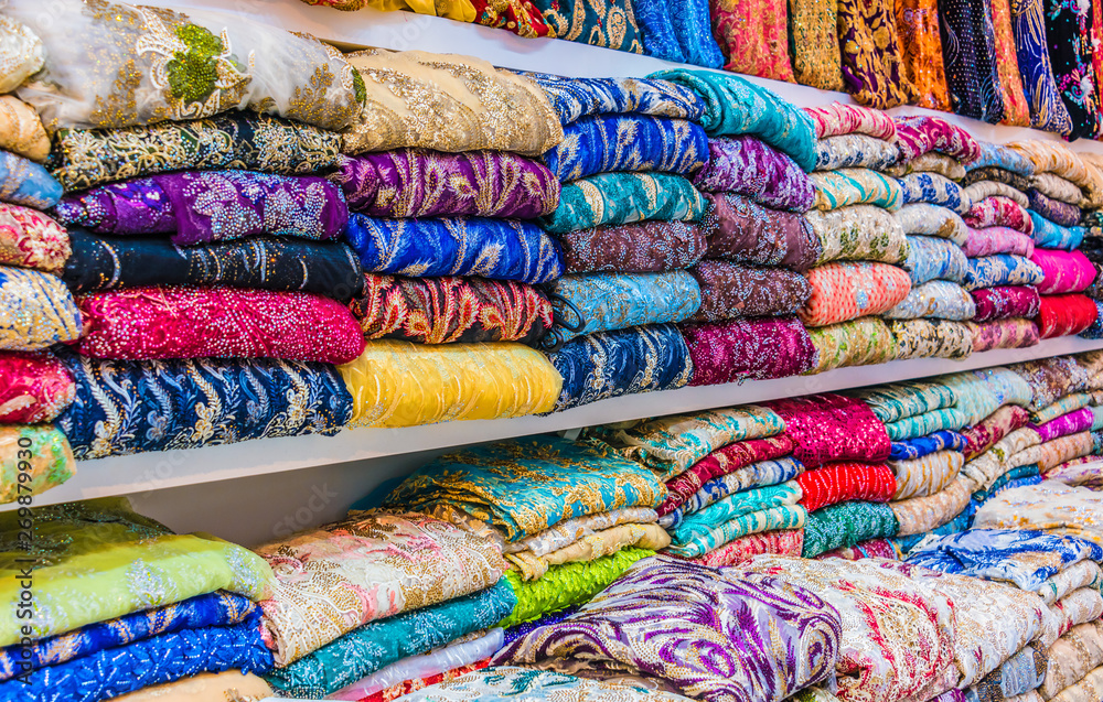 Traditional oriental cloth sold in a store in old town Dubai Traditional oriental cloth sold in a store in old town Dubai