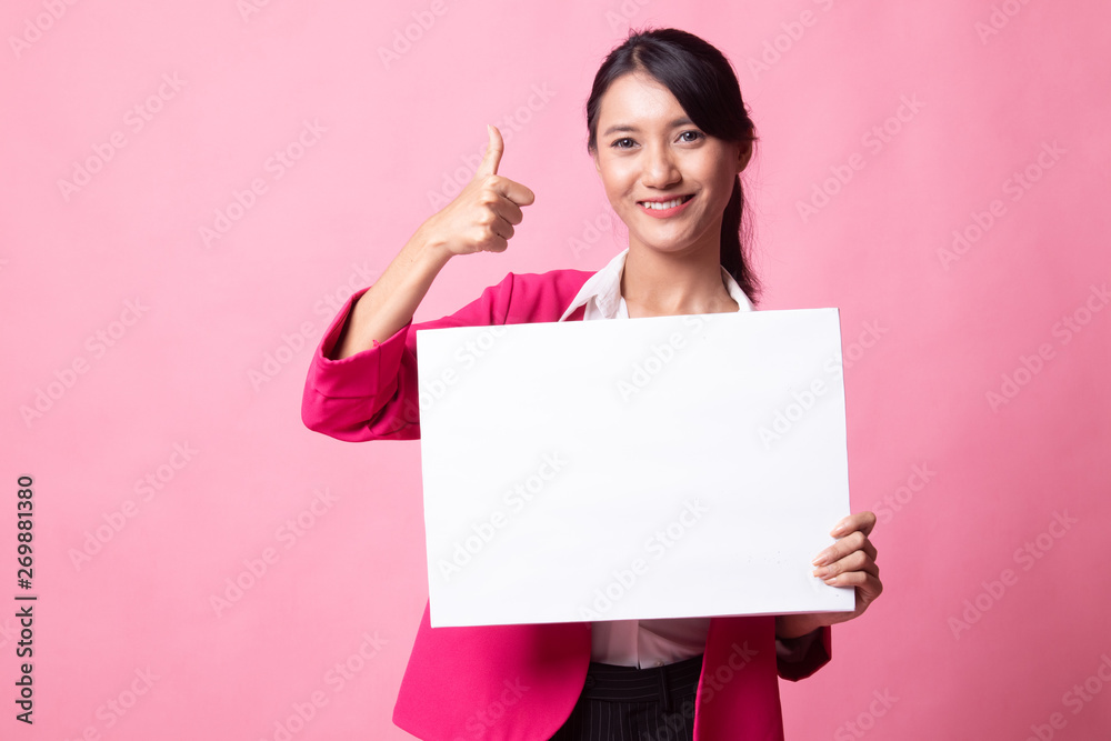 Young Asian woman show thumbs up with white blank sign. Young Asian woman show thumbs up with white blank sign.