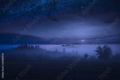 Wallpaper Mural Majestic rising of full moon in a foggy alpine valley Torontodigital.ca