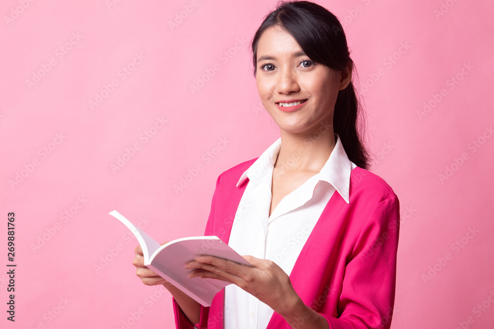 Young Asian woman with a book.