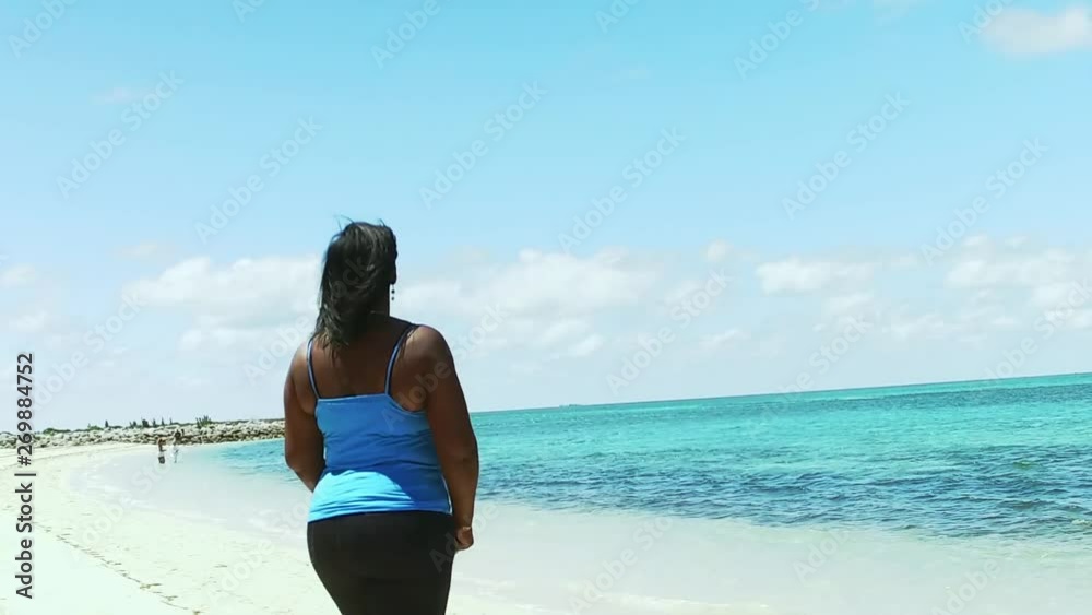 The Original Bahama Mama Walking On The Beach Being Happy, Old Bahama Bay, Bahamas The Original Bahama Mama Walking On The Beach Being Happy, Old Bahama Bay, Bahamas