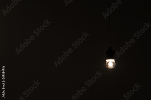 a hanging lamp on dark background