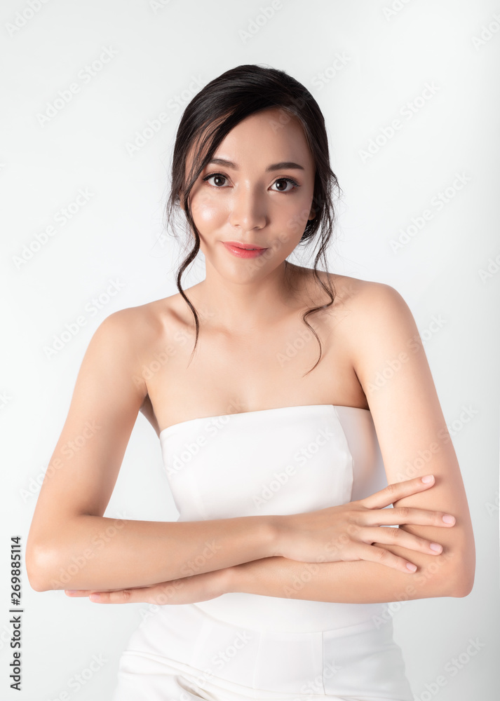 Portrait of Attractive Beauty Asian Women in Fashion Posing with Smiling Face Wearing White Dress on White Background for Cosmetic or Health Media Portrait of Attractive Beauty Asian Women in Fashion Posing with Smiling Face Wearing White Dress on White Background for Cosmetic or Health Media