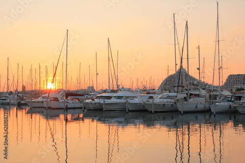 Amazing sunset on the marina of la Grande Motte in Herault, a seaside resort of the Languedoc coast and leisure centre near Montpellier in France