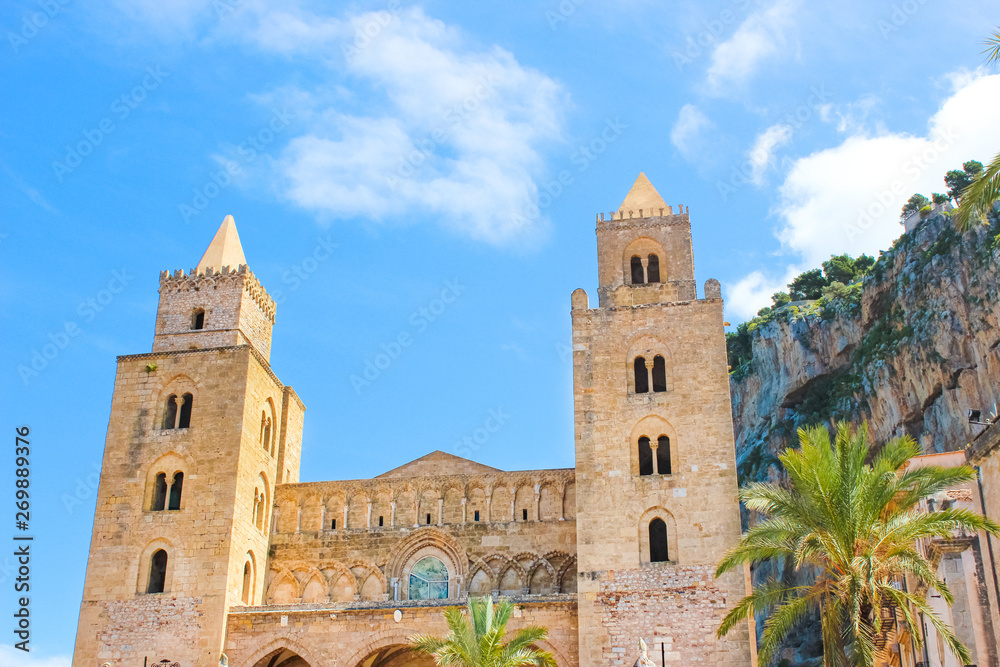 Amazing view of historical Cefalu Cathedral in Italian Sicily. The famous Roman Catholic basilica was built in Norman architectural style. Popular tourist attraction