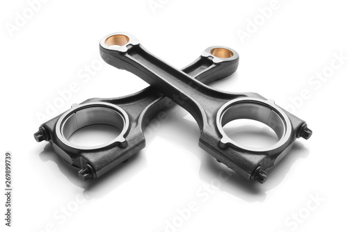 Slika na platnu Connecting rod from a car engine isolated on white