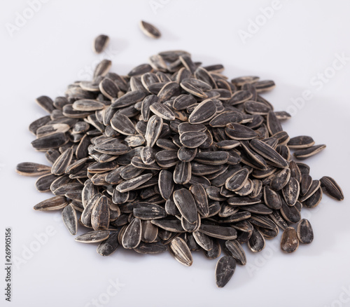 Sunflower seeds on a white surface