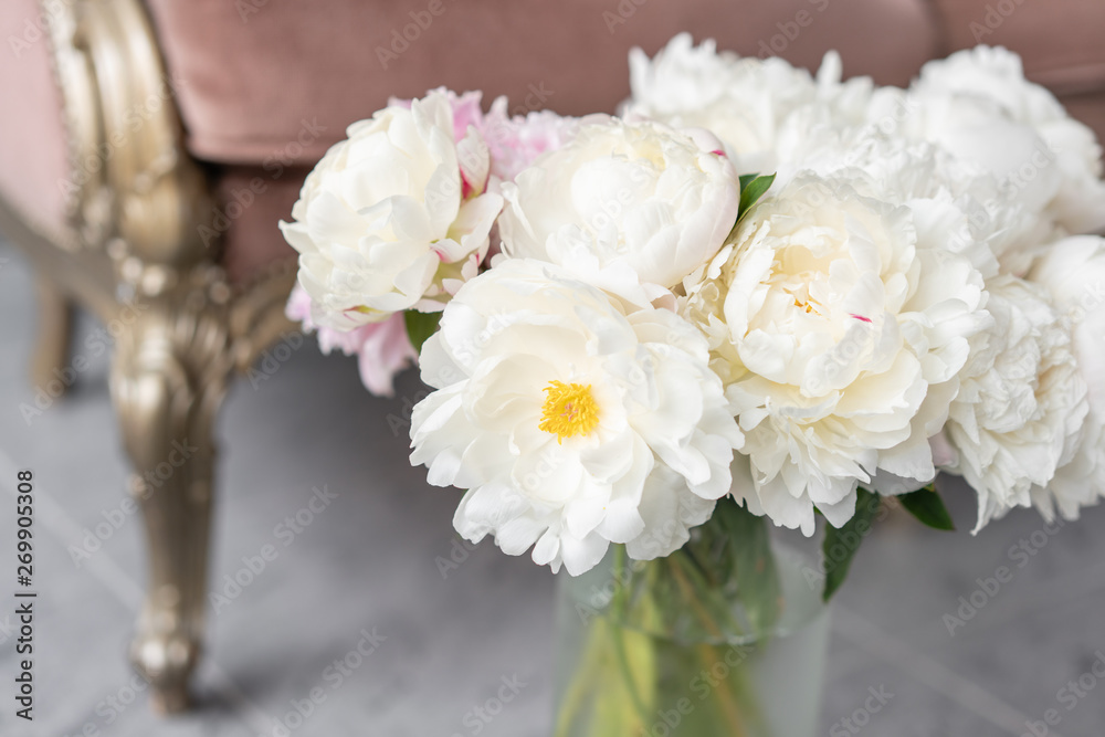 White peonies in a metal vase. Beautiful peony flower for catalog or online store. Floral shop concept . Beautiful fresh cut bouquet. Flowers delivery