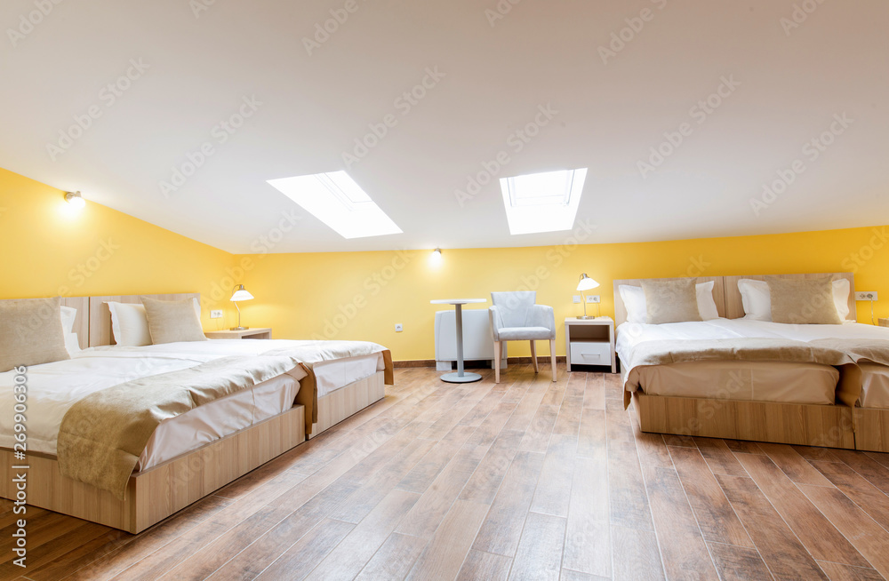 Interior of a bedroom in loft apartment Interior of a bedroom in loft apartment