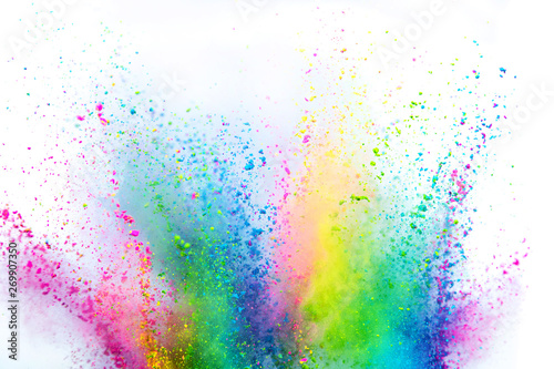 Colored powder explosion on white background. Freeze motion.