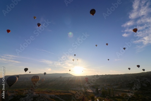 Hot air balloons over Goreme, Turkey, during sunrise.