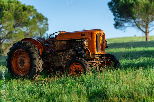 Old tractor in a field, Tuscany, Italy, agriculture