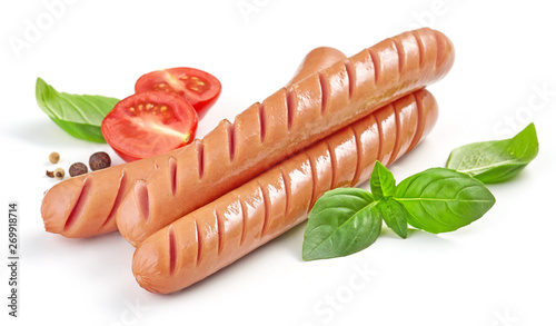 фотографія grilled sausages on white background