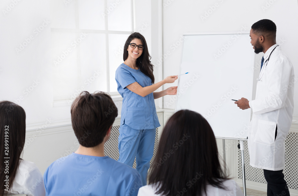 Doctors Sharing Experience With Colleagues At Medical Consultation Doctors Sharing Experience With Colleagues At Medical Consultation