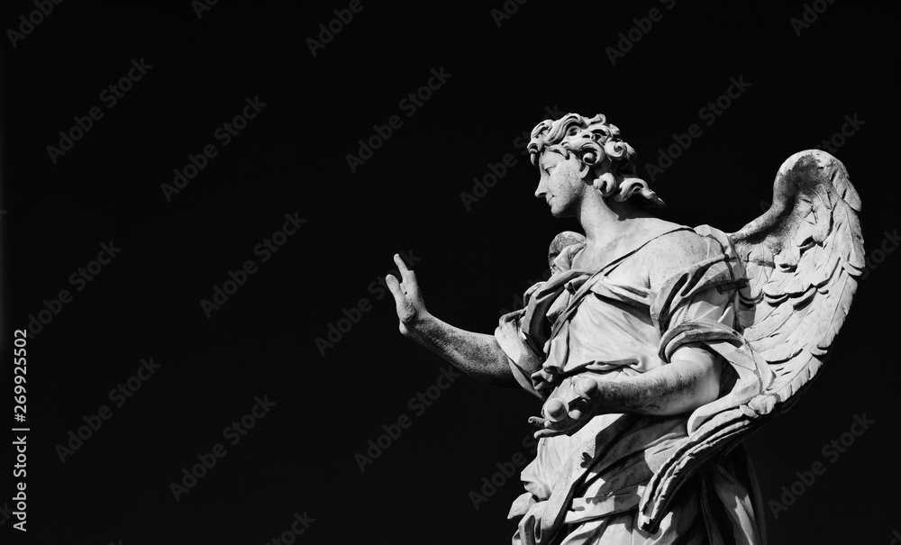 Fototapeta Angel statue holding the Nails of Jesus Cross. A 17th century baroque masterpiece at the top of Sant'Angelo Bridge in the center of Rome (Black and White with copy space)