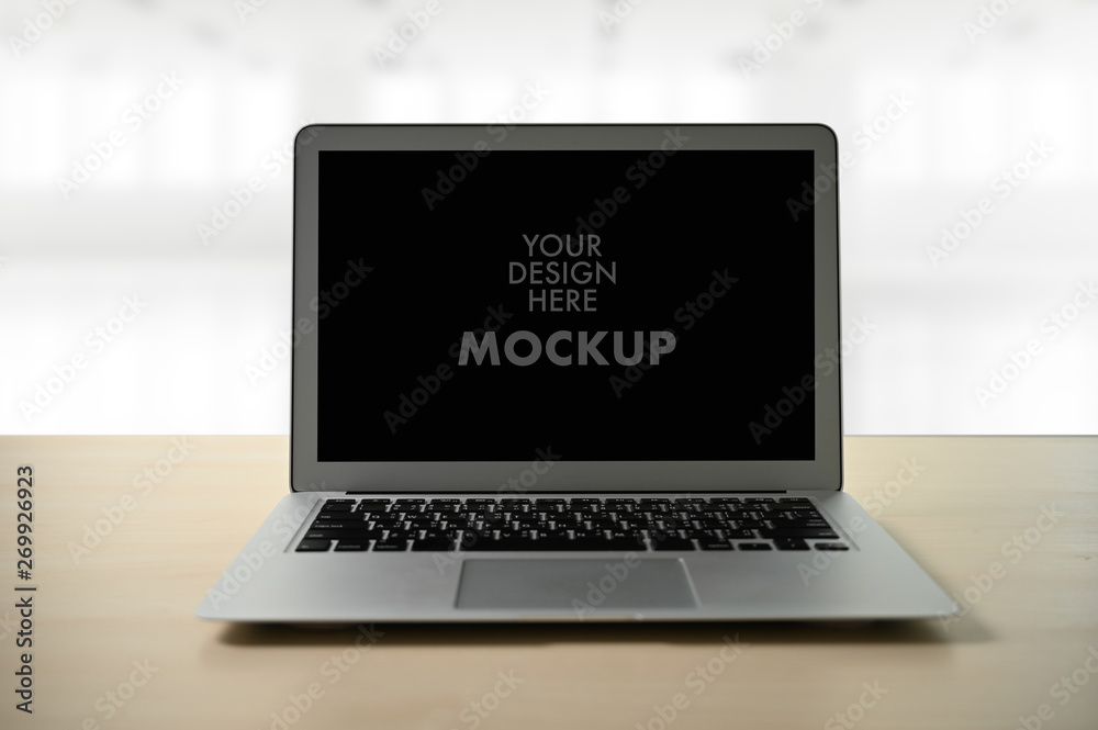Mockup image of business Laptop with blank screen on table blank copy space screen for your advertising text message Mockup image of business Laptop with blank screen on table blank copy space screen for your advertising text message