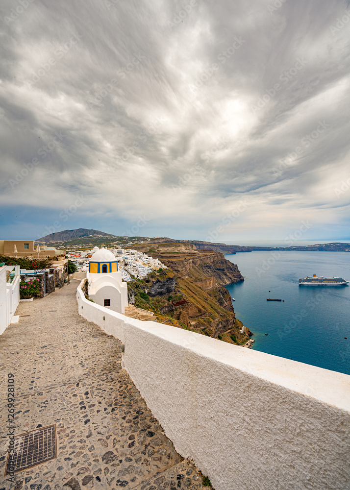 Fototapeta premium Panoramic View and Streets of Santorini Island in Greece, Shot in Thira