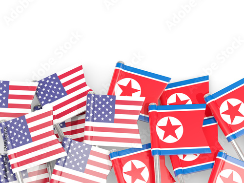 Pins with flags of United States and north korea isolated on white