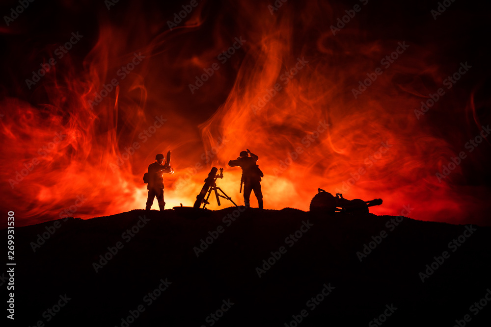 Fototapeta premium War Concept. Military silhouettes fighting scene on war fog sky background,