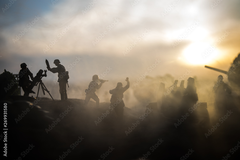 Fototapeta premium War Concept. Military silhouettes fighting scene on war fog sky background,