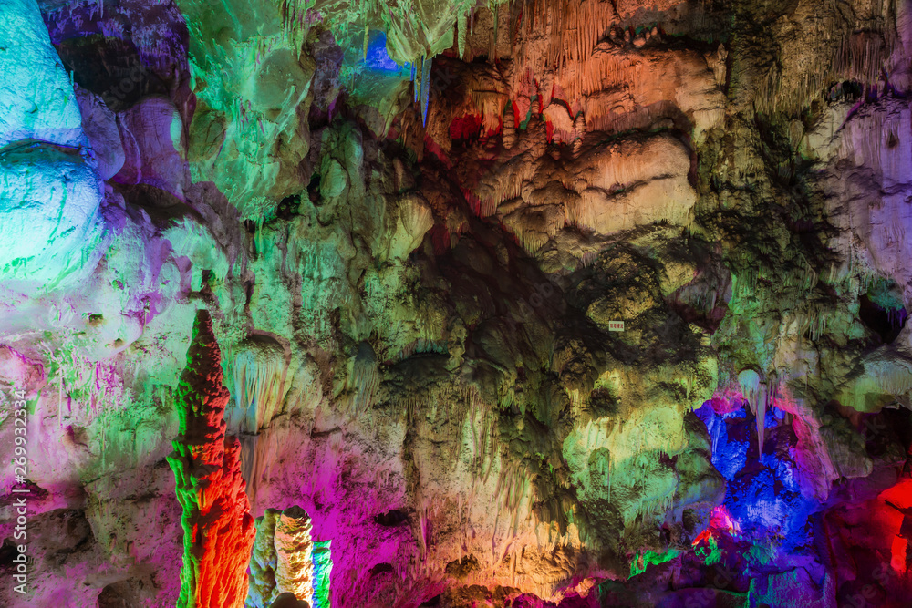 Inside Karst cave, there were colored lights Inside Karst cave, there were colored lights