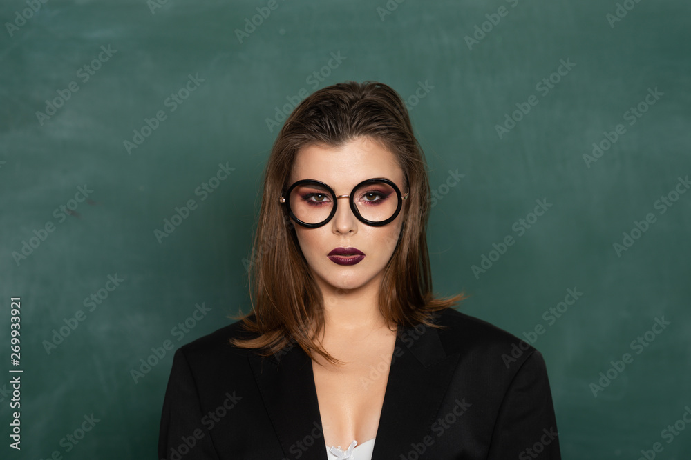 Teenage students with school books. Blonde sexy woman in front of chalkboard. Ready for study. Sensual female student with books. Portrait of an college sexy student girl on campus. Teenage students with school books. Blonde sexy woman in front of chalkboard. Ready for study. Sensual female student with books. Portrait of an college sexy student girl on campus.