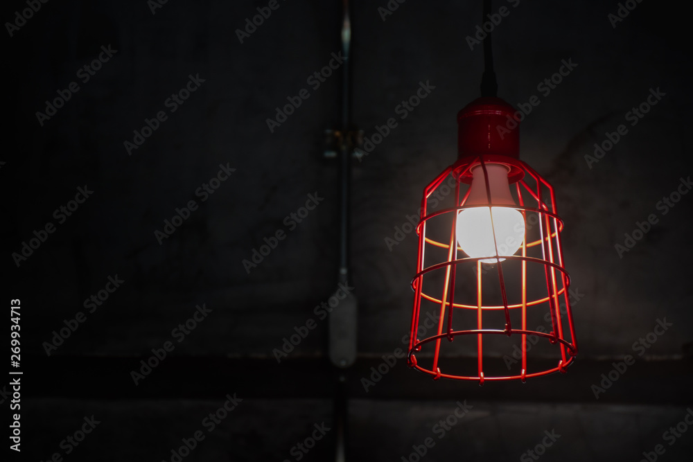 Close up of contemporary lamp hanging from ceiling Close up of contemporary lamp hanging from ceiling