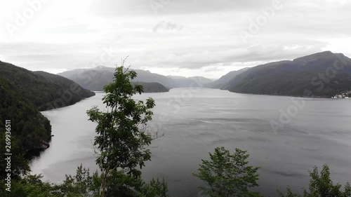 Aerial view. Norwegian landscape. Mountains hills and fjord Saudafjord, evening time, overcast weather. National tourist Ryfylke route photo