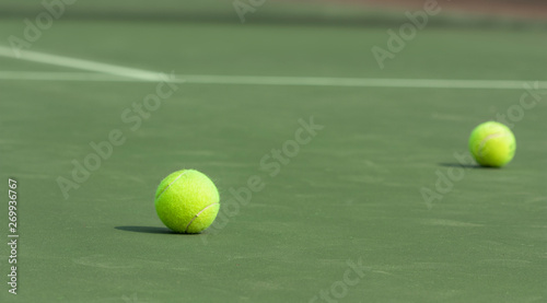 tennis balls on the court as background