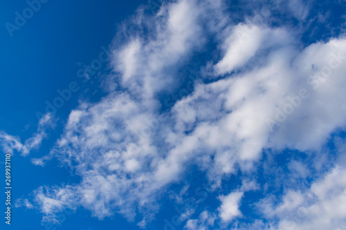 White clouds blue sky. Blue sky with white clouds background. Blue sky with clouds wallpaper. 