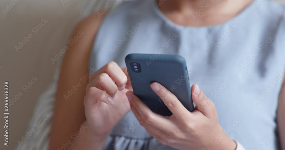 Woman use of mobile phone at home Woman use of mobile phone at home