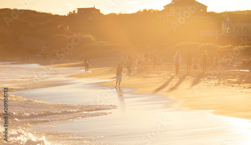 Beachgoers at sunset in Montauk