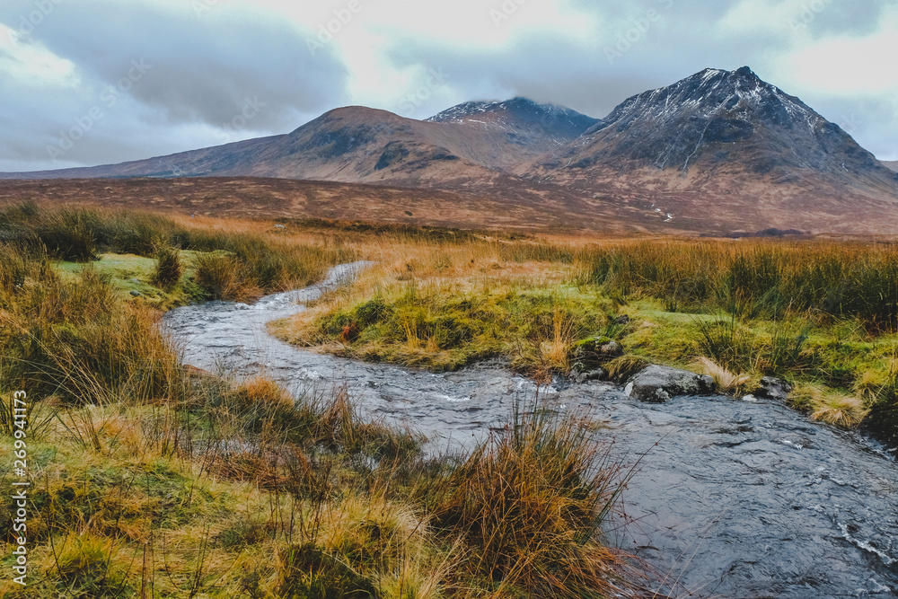 Mountain with water stream scenery taken in Ballachulish Glencoe, Scotland 