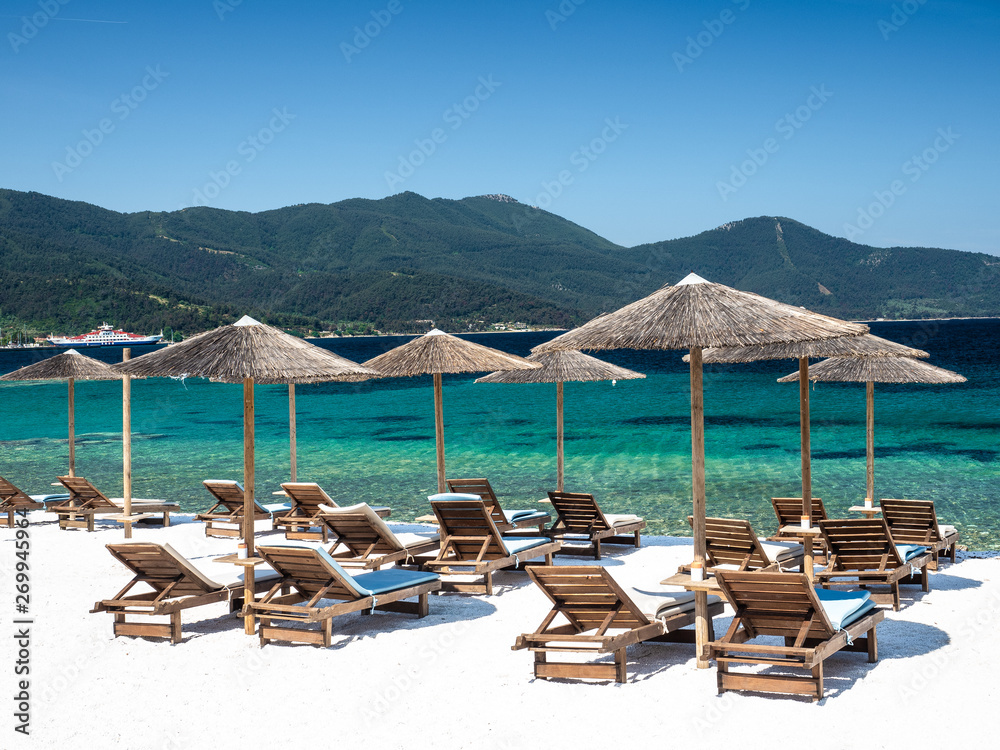 Little beach with marble in Limenas Thasou, capital and main port of Thassos island, Greece