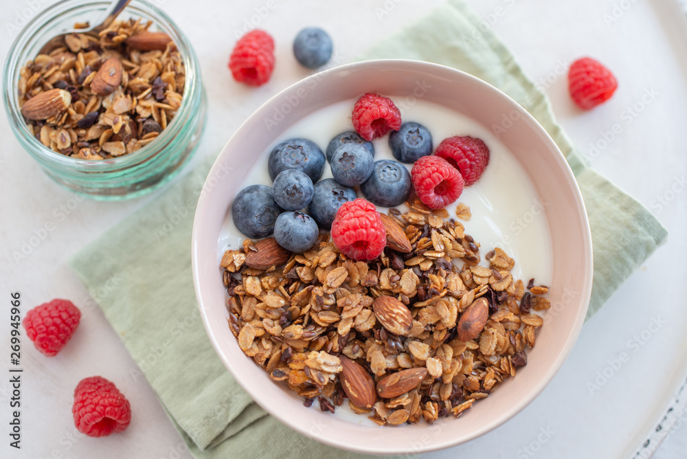 Granola with yogurt and berries for healthy breakfast Granola with yogurt and berries for healthy breakfast