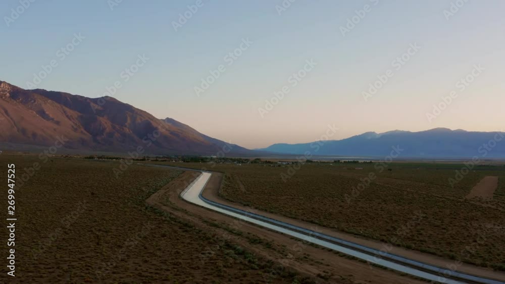 Sunrise at a waterway in the Sierra Nevada. Aerial shot. Sunrise at a waterway in the Sierra Nevada. Aerial shot.