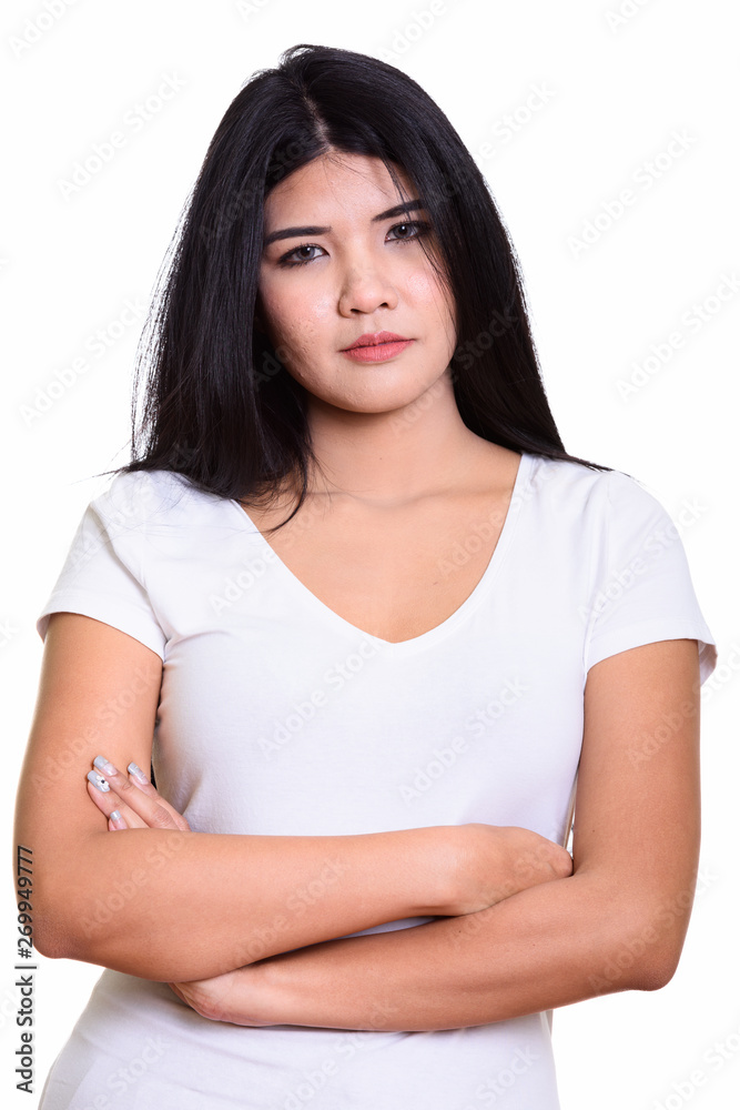 Studio Portrait Of Young Asian Woman Isolated Against White Background Studio Portrait Of Young Asian Woman Isolated Against White Background