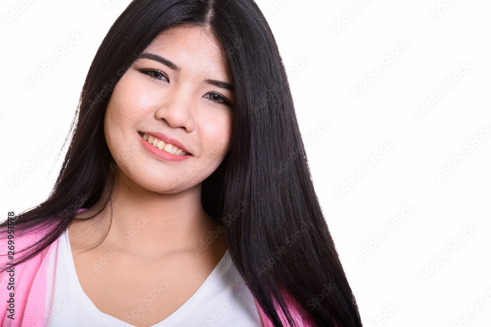 Studio Portrait Of Young Asian Woman Isolated Against White Background Studio Portrait Of Young Asian Woman Isolated Against White Background