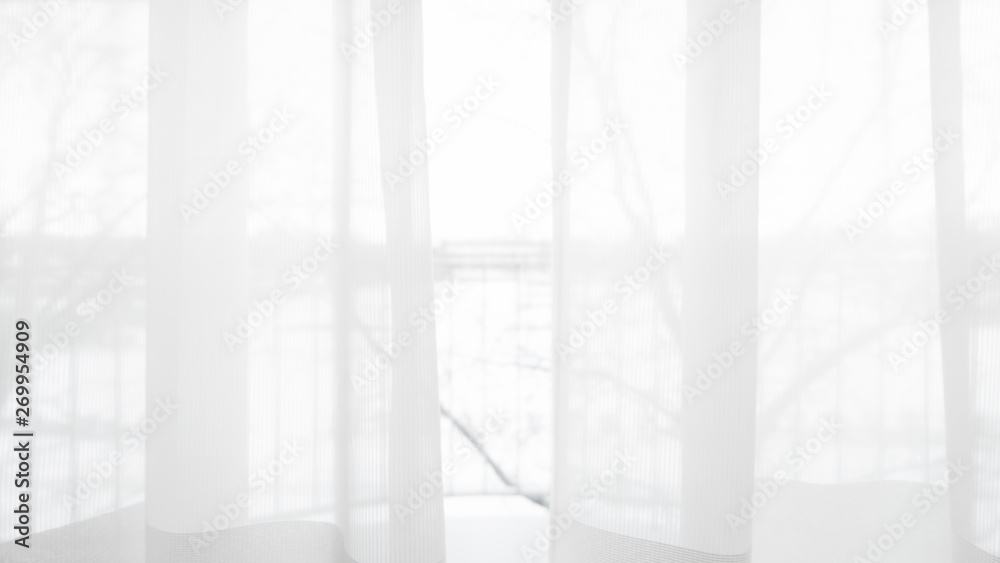 Blur curtain window and stationery box with sunlight.