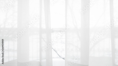 Blur curtain window and stationery box with sunlight.